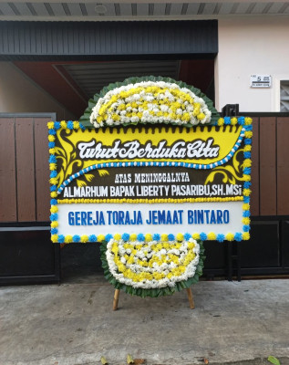 Papan Bunga Duka di Subarang Batuang